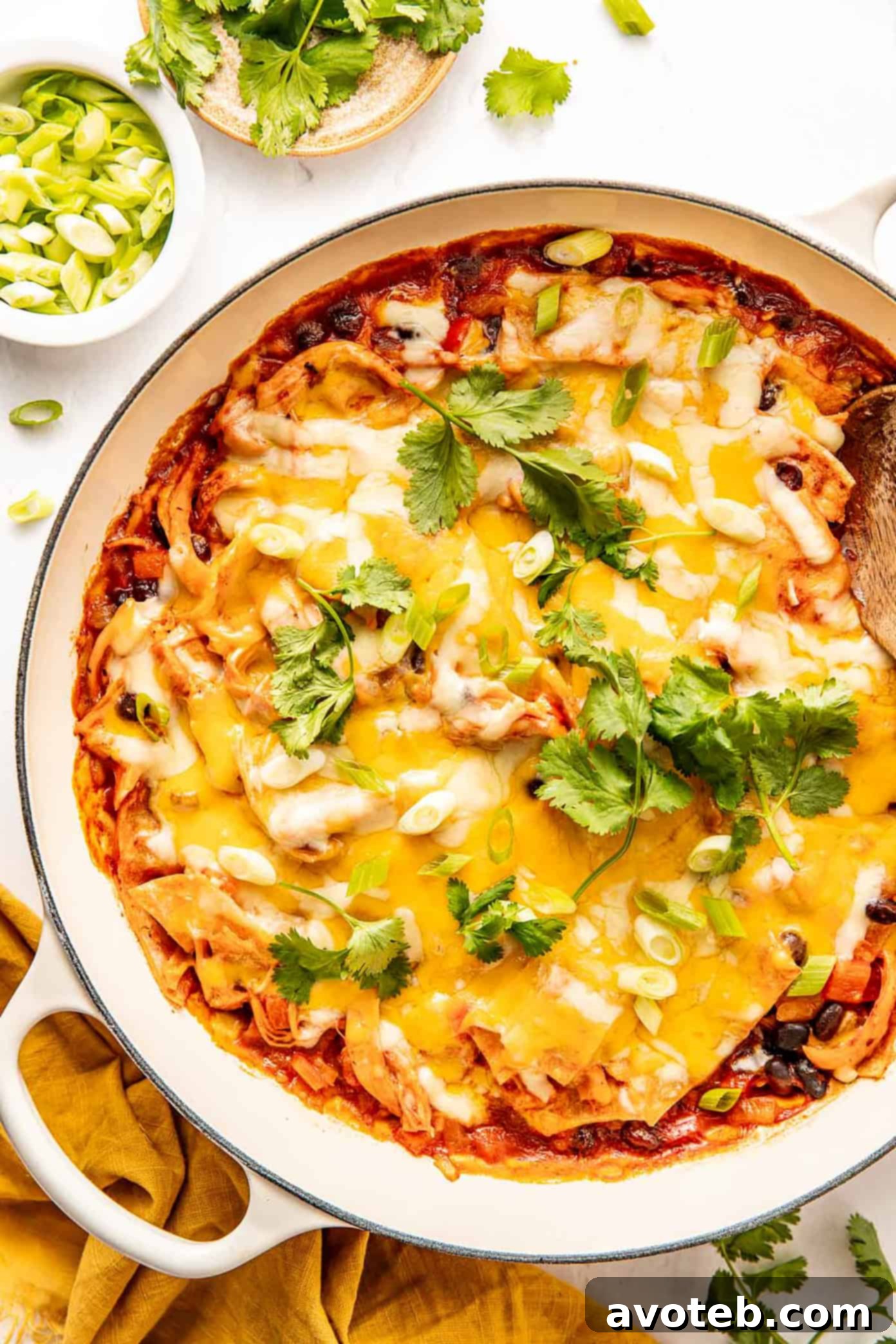 Chicken Enchilada Skillet ready for serving with garnishes