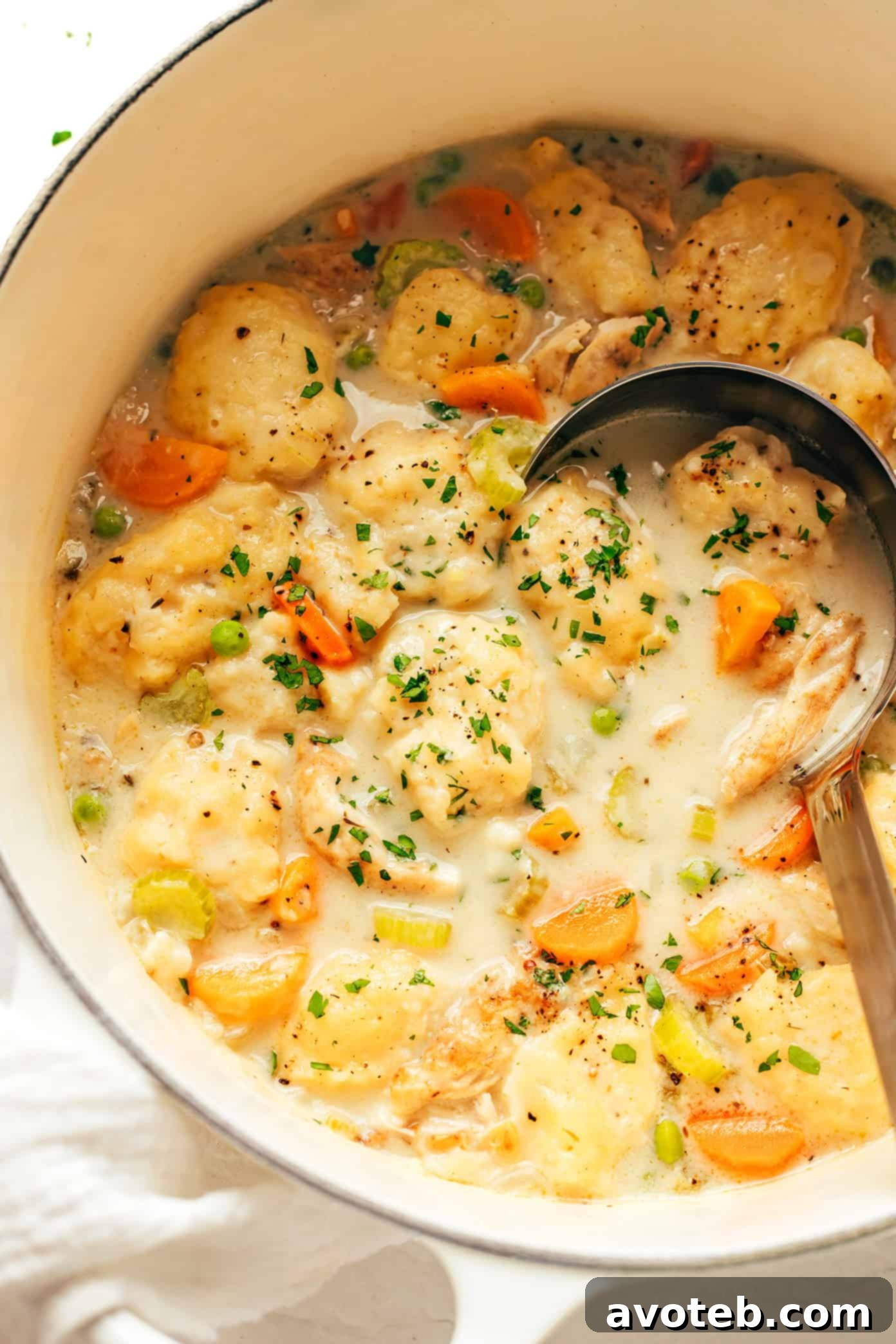 Delicious chicken and dumplings served in a large bowl, ready to enjoy
