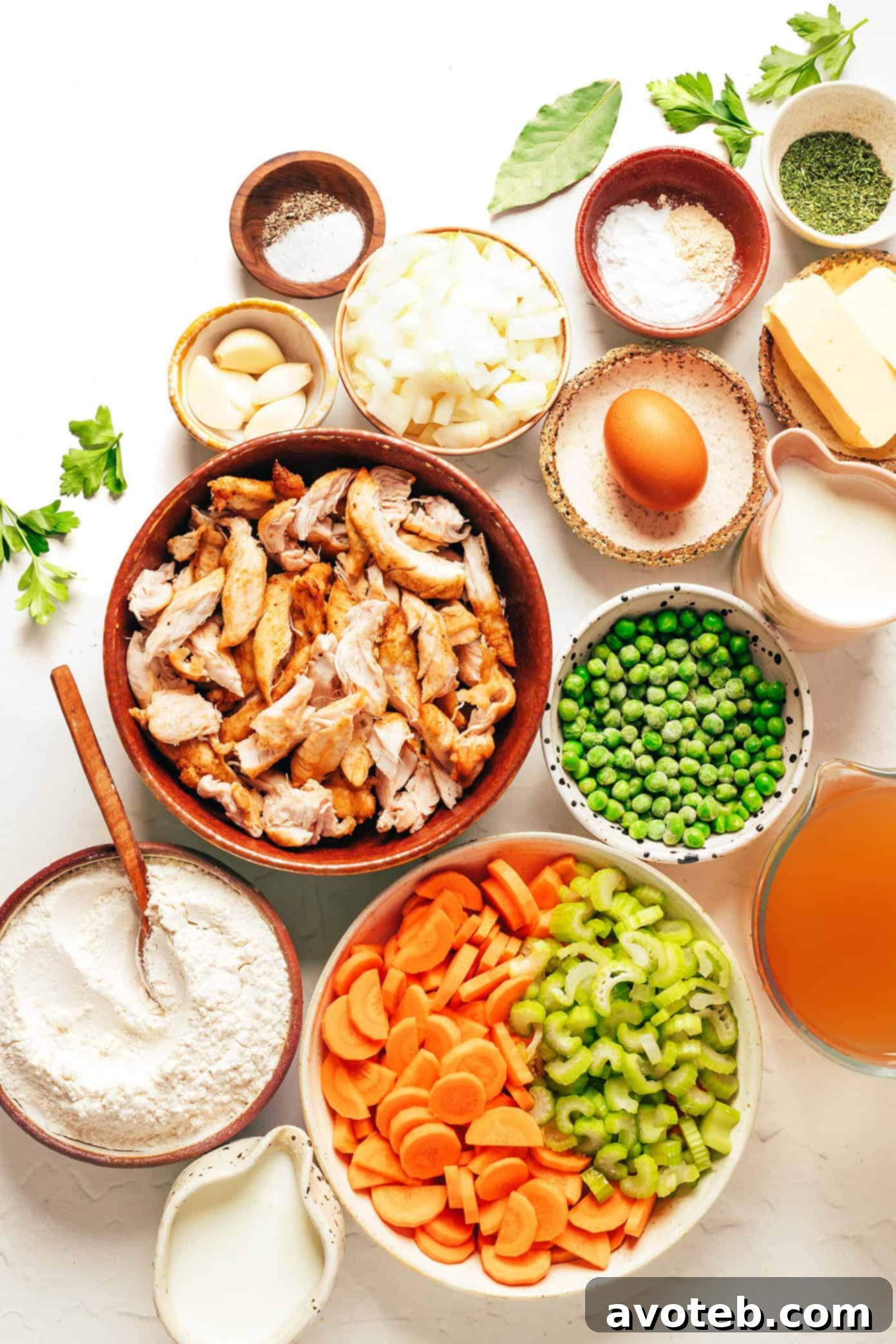 Assorted fresh ingredients laid out for making chicken and dumplings