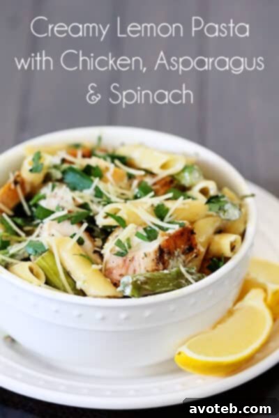 Lemon Rosemary Pasta served in a bowl, garnished with fresh parsley and Parmesan cheese