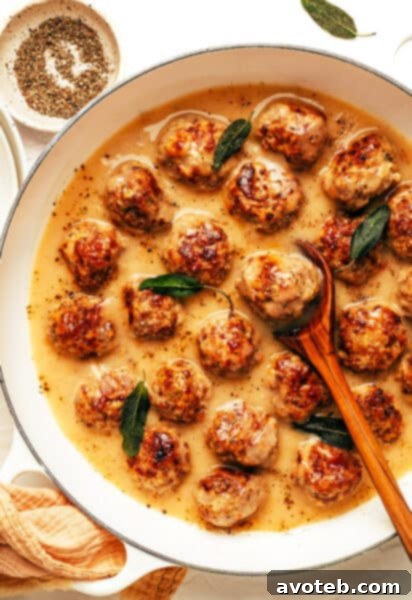 A close-up of the delicious turkey meatballs with gravy, ready for serving.