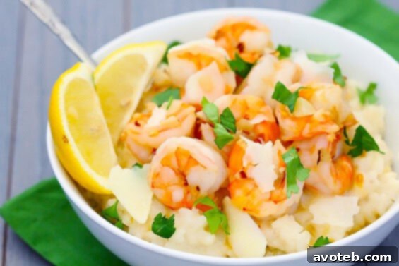 Close-up of Shrimp Scampi With Parmesan Risotto, showcasing the creamy rice and perfectly cooked shrimp