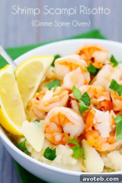 A beautifully plated dish of Shrimp Scampi with Parmesan Risotto, garnished for presentation on a rustic table