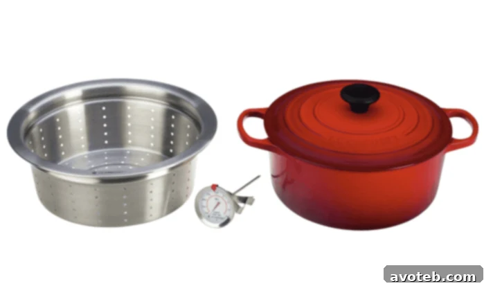 The Le Creuset Simmer, Steam & Fry Set in vibrant red, the grand prize for the Tomato Love Recipe Exchange.