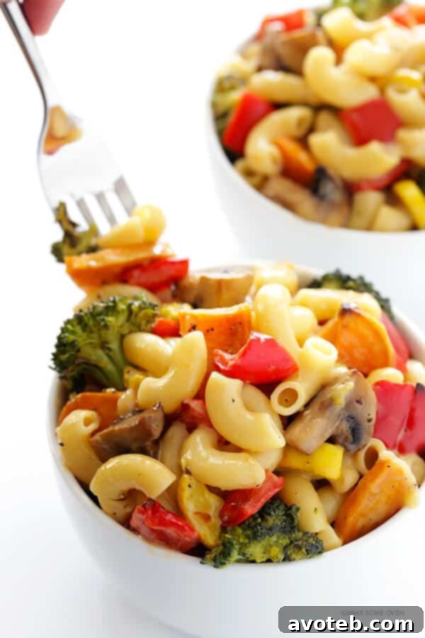 Roasted Vegetable Mac and Cheese with colorful vegetables and creamy sauce.