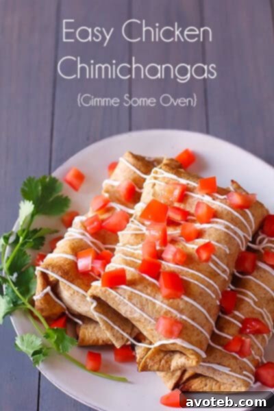 Close-up of baked chicken chimichangas, golden brown and perfectly crispy.