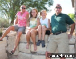 Portrait of Kansas pork farmer Jim Crane with his family on their farm