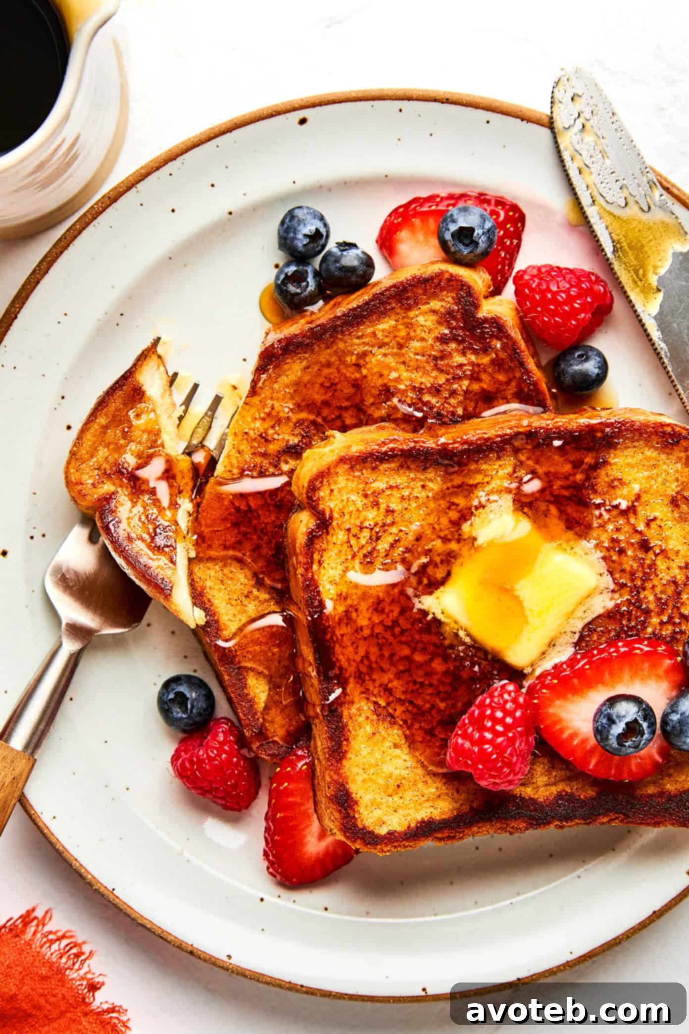 Classic French Toast with maple syrup and berries
