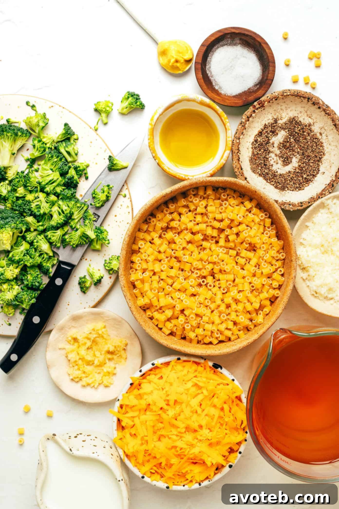 A close-up shot of the creamy broccoli pasta being stirred in a skillet, showing its texture and vibrant color.