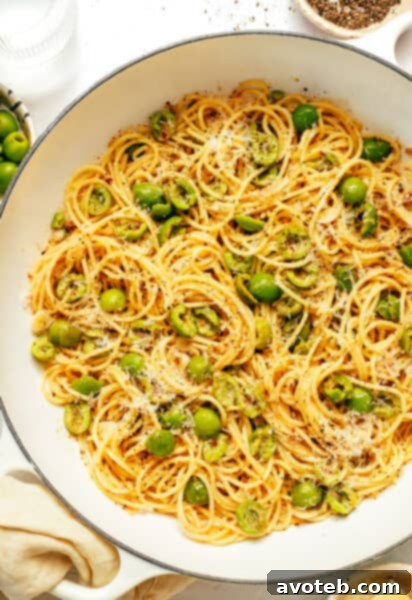 A serving of dirty martini pasta in a white bowl